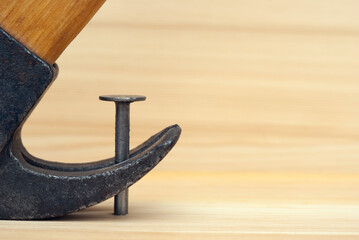 One  iron nail and a hammer