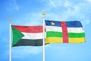 Sudan and Central African Republic two flags on flagpoles and blue sky