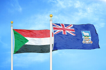 Sudan and Falkland Islands two flags on flagpoles and blue sky