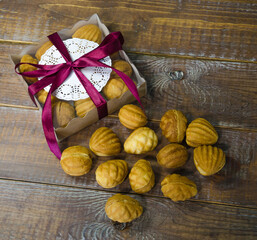 Retro sweets with caramel on wood in gift box