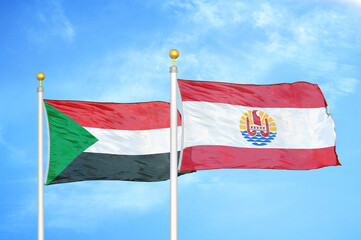 Naklejka na ściany i meble Sudan and French Polynesia two flags on flagpoles and blue sky