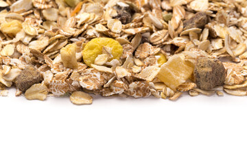oatmeal with raisins, coconut, pineapple and banana slices isolated on a white background. For packing oatmeal or granola.