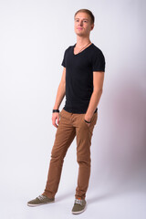 Naklejka premium Portrait of handsome man against white background
