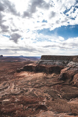 Fototapeta na wymiar Alstrom Point at Lake Powell. Deep blue sky with lots of clouds. Lake view on the top of plateau.