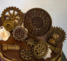 Gorgeous extra chocolate steam punk cake with gilded glaze