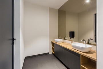 Naklejka na ściany i meble Interior of a hotel bathroom interior with shower cabin