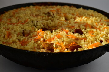 Pilaf in a cast iron pan