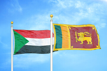 Sudan and Sri Lanka two flags on flagpoles and blue sky