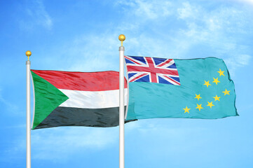 Sudan and Tuvalu two flags on flagpoles and blue sky