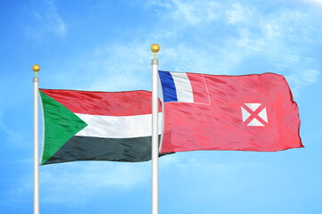 Naklejka na ściany i meble Sudan and Wallis and Futuna two flags on flagpoles and blue sky