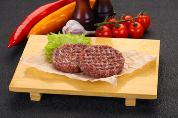 Raw burger cutlet