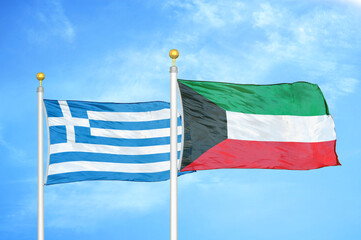 Greece and Kuwait two flags on flagpoles and blue sky