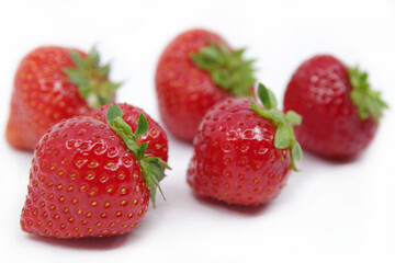Strawberries isolated on a white background. Red strawberries on a white background	