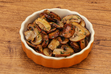 Roasted champignon with herbs and spices