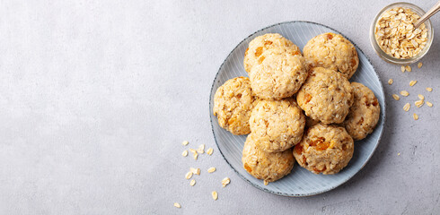 Healthy vegan oat cookies. Grey background. Copy space. Top view.