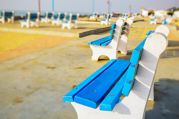 Elegant decorative contrete made sitting arrangement in the sea beach side on the background of blue sky.india. Asia. 2018.