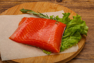 Salmon piece steak served rosemary