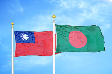 Taiwan and Bangladesh two flags on flagpoles and blue sky
