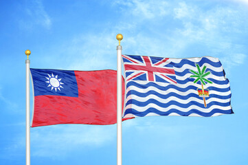 Taiwan and British Indian Territory two flags on flagpoles and blue sky