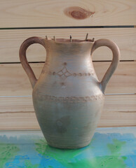 an old jug of scented sticks