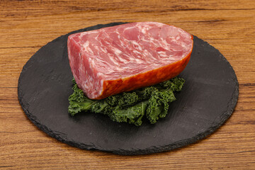 Beef ham piece over board