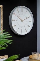  modern clock on a home wall