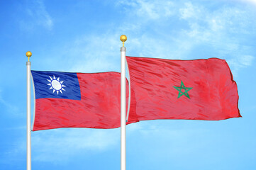 Taiwan and Morocco two flags on flagpoles and blue sky
