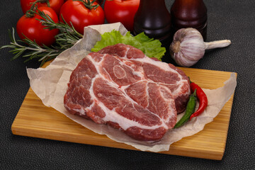 Raw pork neck steak