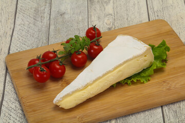 Brie cheese triangle served salad