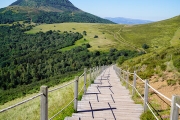 wooden staircase for hiking and access to the Puy de Dôme volcano in Auvergne