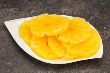 Marinated pineapple rings in the bowl