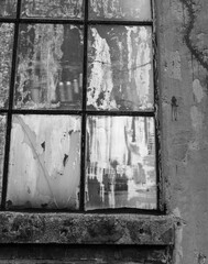 Black and white texture of an old industrial building window panes.