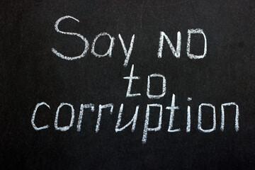 
Chalkboard lettering say no to corruption. Reflection of social problems
