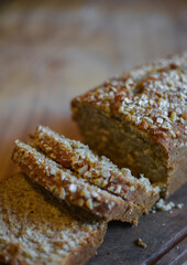 slice of homemade banana bread pudding on wooden table
