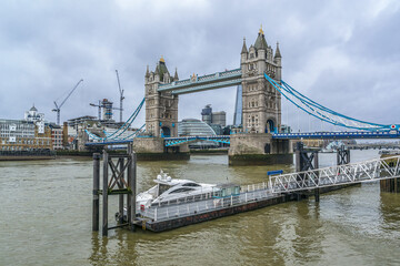 Fototapeta na wymiar Tower Bridge (1886 - 1894) over River Thames - iconic symbol of London. Tower Bridge is close to Tower of London, from which it takes its name. London, England.