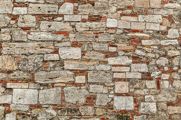 stone texture background tough and solid weathered wall with many rectangular cobblestone