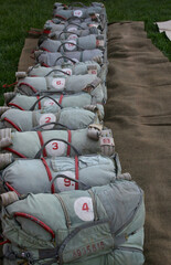 Obraz premium folded parachutes D-6 on sacking before jumping 