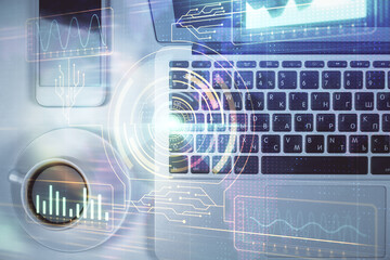 Multi exposure of data theme drawing hologram over topview work desk background with computer. Concept of technology.