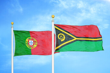 Portugal and Vanuatu two flags on flagpoles and blue sky