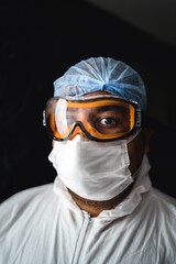 doctor and his protective equipment to fight covid19  - 368535440