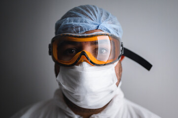 doctor and his protective equipment to fight covid19  - 368535478