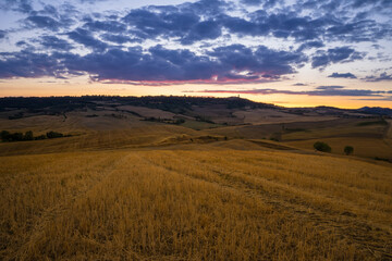 Dusk of a summer morning in Val d'Orcia, Pienza, Tuscany, Italy