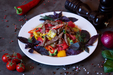 Delicious food on a grey table