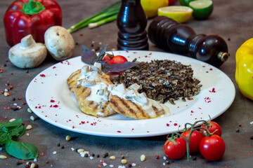 Delicious food on a grey table