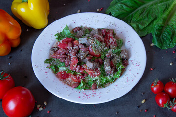 Delicious food on a grey table