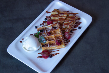 Delicious food on a grey table