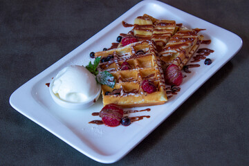 Delicious food on a grey table