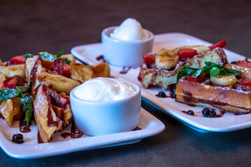 Delicious food on a grey table