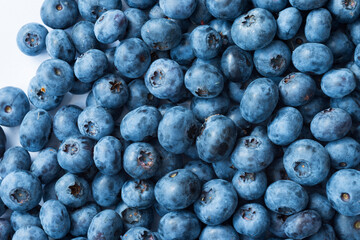 Fresh blueberries placed on a white background.  Blueberry - king of the healthy foods top view