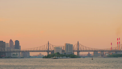 landscape of manhattan and queensboro bridge  sunset time 